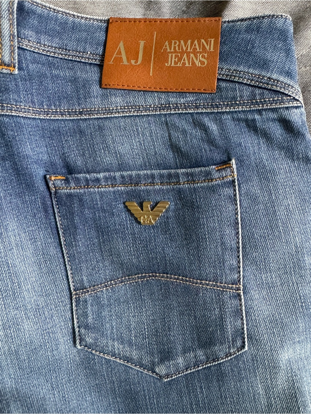 Armani Jeans Slim women’s Light Blue Denim with Gold Eagle Accent